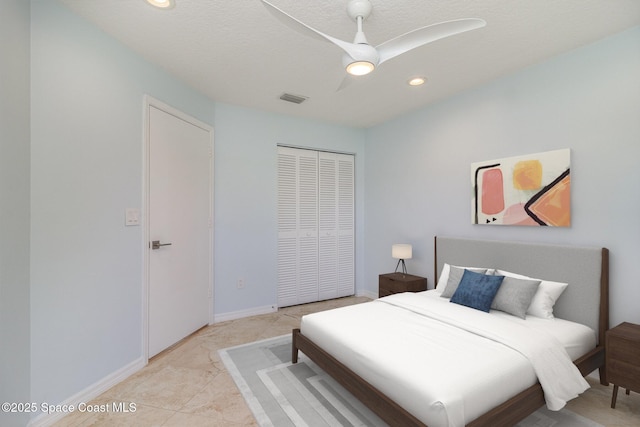 bedroom featuring a closet, recessed lighting, a ceiling fan, and baseboards