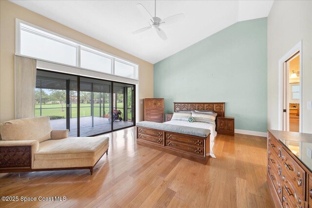 649 Spring Lake Dr, Melbourne, FL 32940 - bedroom featuring access to outside, high vaulted ceiling, light wood-style flooring, baseboards, and ceiling fan