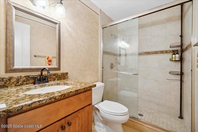 649 Spring Lake Dr, Melbourne, FL 32940 - full bath with toilet, a stall shower, and vanity