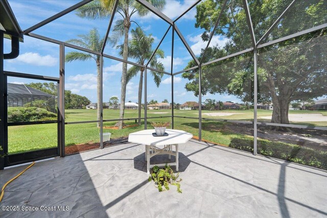 649 Spring Lake Dr, Melbourne, FL 32940 - unfurnished sunroom featuring view of golf course