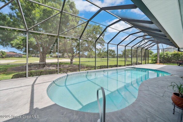 649 Spring Lake Dr, Melbourne, FL 32940 - swimming pool featuring a lanai and a patio