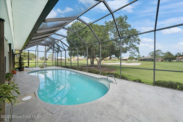 649 Spring Lake Dr, Melbourne, FL 32940 - outdoor pool featuring a patio area, a yard, and glass enclosure