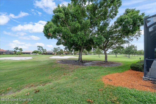 649 Spring Lake Dr, Melbourne, FL 32940 - view of green lawn