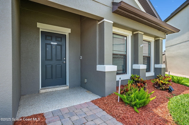 4065 Harvest Cir, Rockledge, FL 32955 - property entrance featuring stucco siding