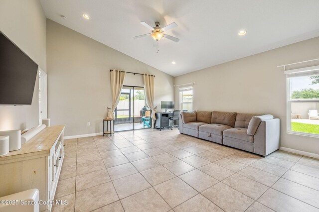 4065 Harvest Cir, Rockledge, FL 32955 - living area featuring ceiling fan, light tile patterned floors, high vaulted ceiling, baseboards, and recessed lighting