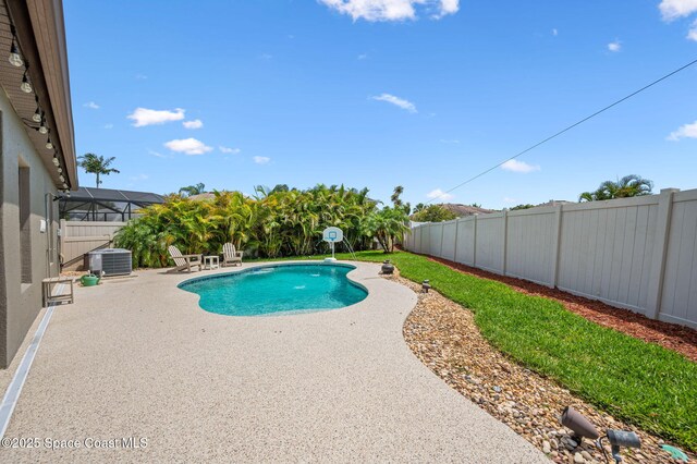 4065 Harvest Cir, Rockledge, FL 32955 - view of pool with a patio area, a fenced backyard, and cooling unit