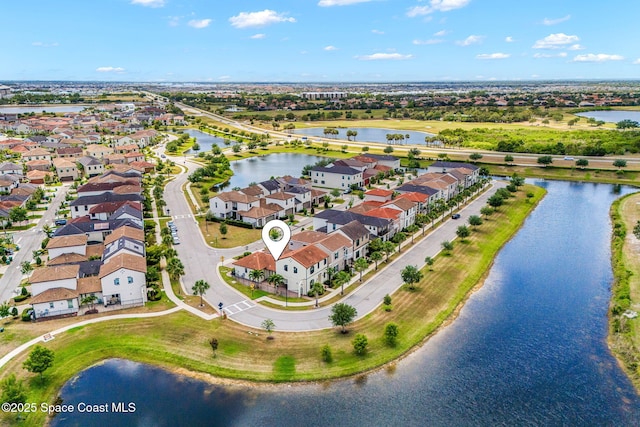 6794 Vista Hermosa Dr, Melbourne, FL 32940 - aerial perspective of suburban area with a nearby body of water