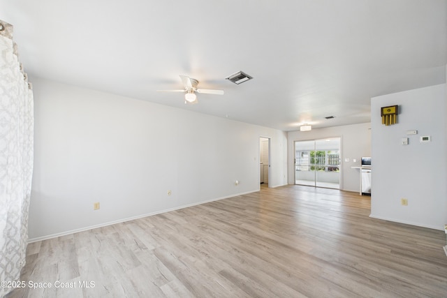 959 Eyerly Ln NE, Palm Bay, FL 32905 - empty room featuring light wood-style flooring and ceiling fan