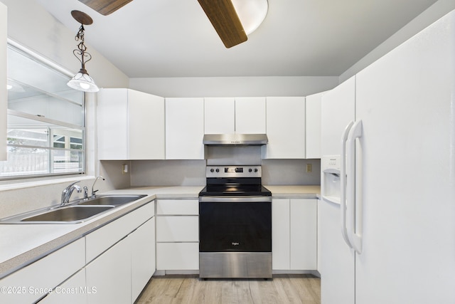 959 Eyerly Ln NE, Palm Bay, FL 32905 - kitchen featuring stainless steel electric stove, white refrigerator with ice dispenser, under cabinet range hood, white cabinets, and light countertops