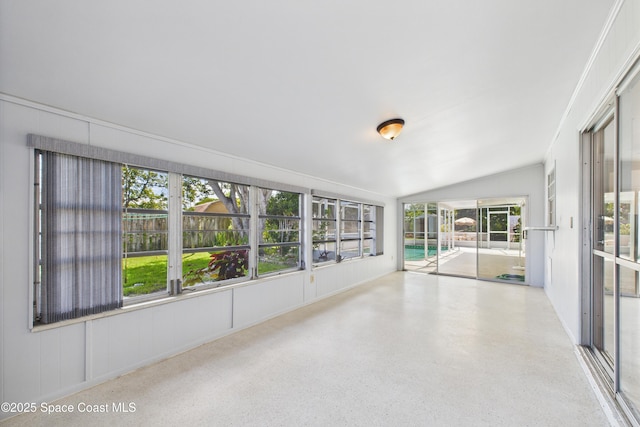 959 Eyerly Ln NE, Palm Bay, FL 32905 - unfurnished sunroom featuring lofted ceiling and speckled floor