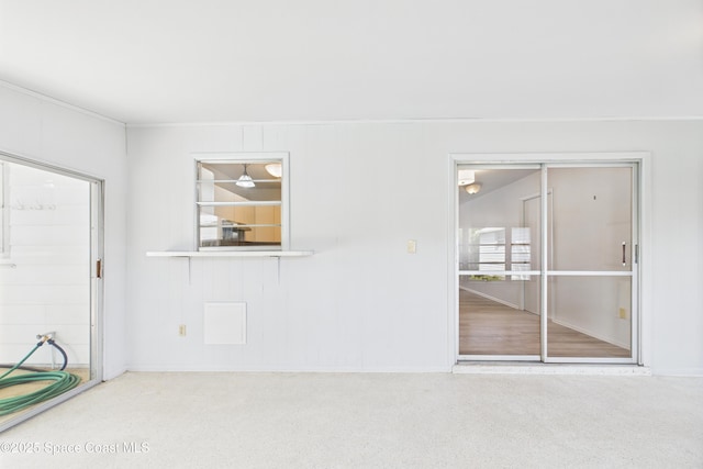 959 Eyerly Ln NE, Palm Bay, FL 32905 - spare room featuring baseboards and crown molding