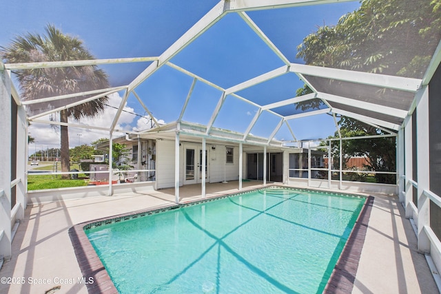 959 Eyerly Ln NE, Palm Bay, FL 32905 - swimming pool with a patio area and a lanai