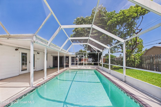 959 Eyerly Ln NE, Palm Bay, FL 32905 - view of swimming pool with a patio and glass enclosure