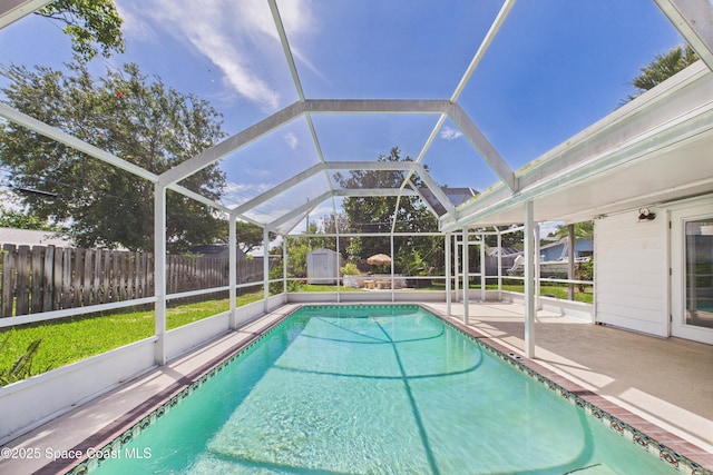 959 Eyerly Ln NE, Palm Bay, FL 32905 - view of pool featuring a fenced backyard, a patio, and glass enclosure