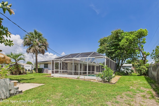 959 Eyerly Ln NE, Palm Bay, FL 32905 - fenced backyard with glass enclosure