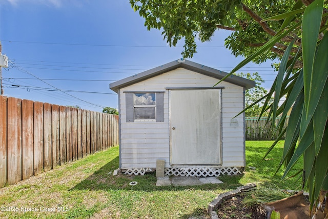 959 Eyerly Ln NE, Palm Bay, FL 32905 - view of shed with a fenced backyard