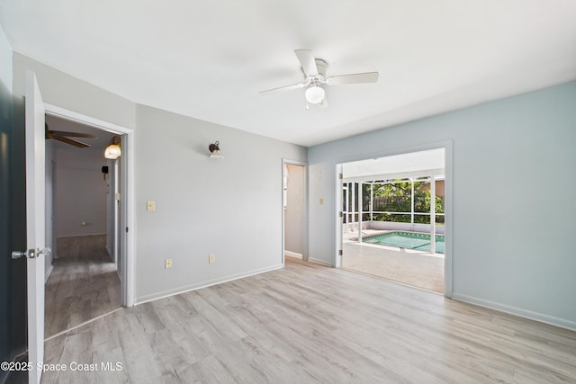 959 Eyerly Ln NE, Palm Bay, FL 32905 - spare room with a ceiling fan and wood finished floors