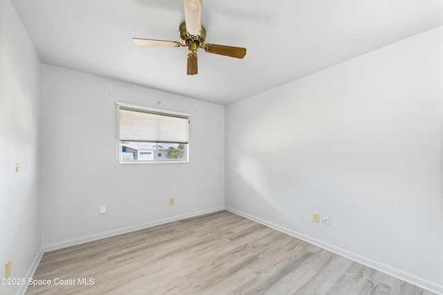 959 Eyerly Ln NE, Palm Bay, FL 32905 - unfurnished room featuring wood finished floors and a ceiling fan
