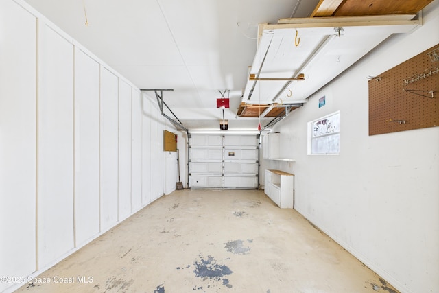 959 Eyerly Ln NE, Palm Bay, FL 32905 - garage featuring a garage door opener