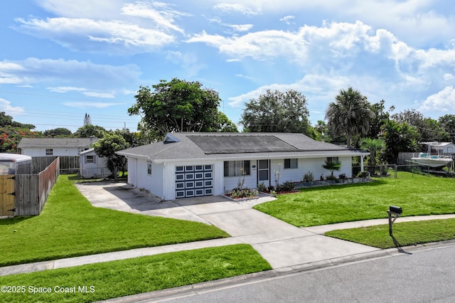 959 Eyerly Ln NE, Palm Bay, FL 32905 - ranch-style home with a garage and driveway