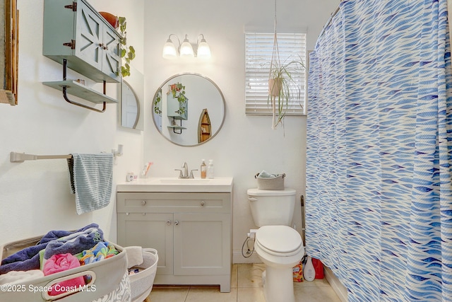 full bathroom with toilet, vanity, tile patterned flooring, and curtained shower