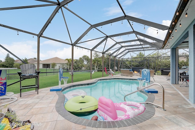 swimming pool with a patio and glass enclosure