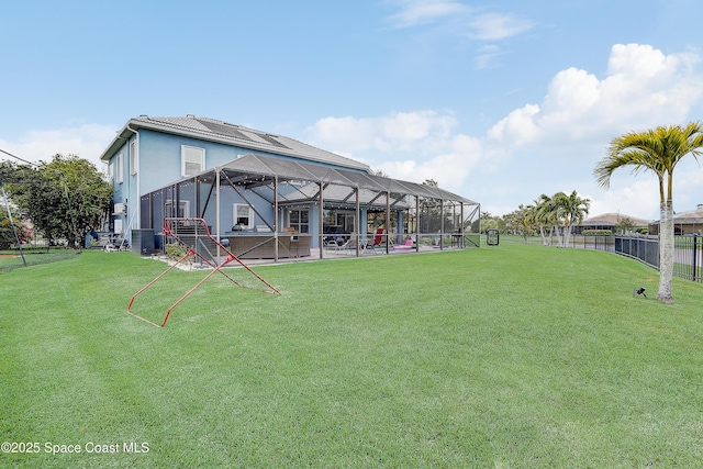 view of yard with a lanai and a patio area