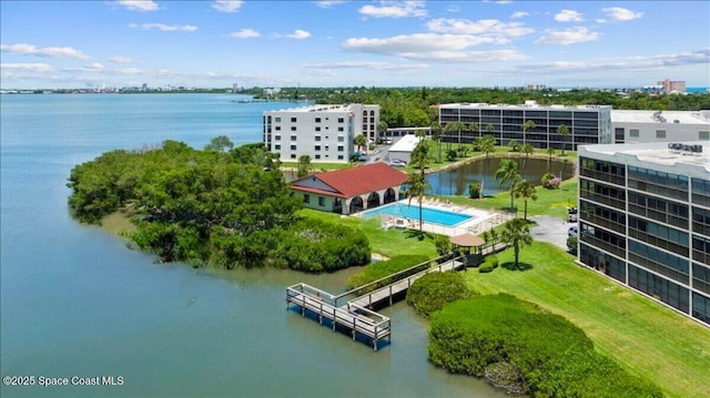 5807 N Atlantic Ave Unit 521, Cape Canaveral, FL 32920 - drone / aerial view of a large body of water and a pool area