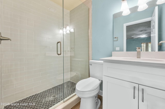 5807 N Atlantic Ave Unit 521, Cape Canaveral, FL 32920 - bathroom with a stall shower, toilet, and vanity