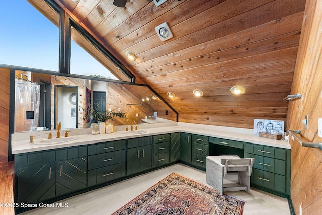 bathroom featuring wooden ceiling, wooden walls, double vanity, and vaulted ceiling