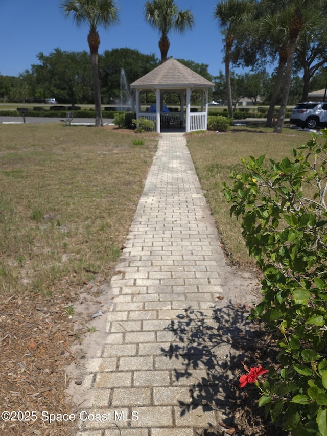 1810 Long Iron Dr Unit 327, Rockledge, FL 32955 - view of property's community featuring a gazebo and a lawn
