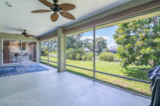 1132 Cypress Trace Dr, Melbourne, FL 32940 - unfurnished sunroom with a ceiling fan