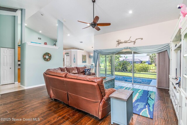 1132 Cypress Trace Dr, Melbourne, FL 32940 - living room with a ceiling fan, dark wood finished floors, baseboards, high vaulted ceiling, and recessed lighting