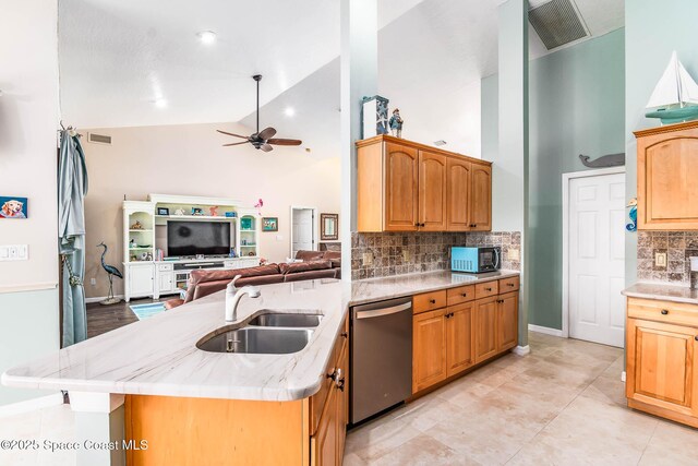 1132 Cypress Trace Dr, Melbourne, FL 32940 - kitchen with dishwasher, a sink, open floor plan, high vaulted ceiling, and tasteful backsplash