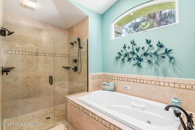 1132 Cypress Trace Dr, Melbourne, FL 32940 - bathroom featuring a stall shower and a bath