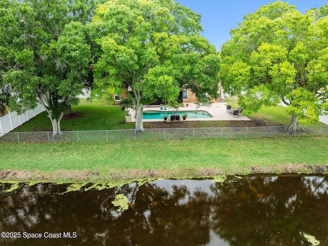 2449 Willowbrook Rd, Merritt Island, FL 32952 - view of property's community with a patio area, a pool, and a water view