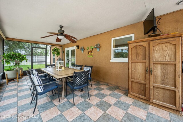 2449 Willowbrook Rd, Merritt Island, FL 32952 - sunroom with ceiling fan, outdoor dining space, and french doors