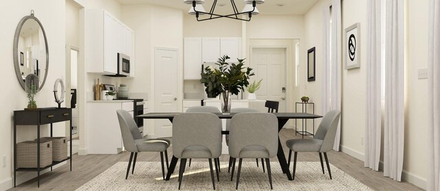 2432 Antarus Dr NW, Palm Bay, FL 32907 - dining area featuring baseboards, a notable chandelier, and light wood-style flooring