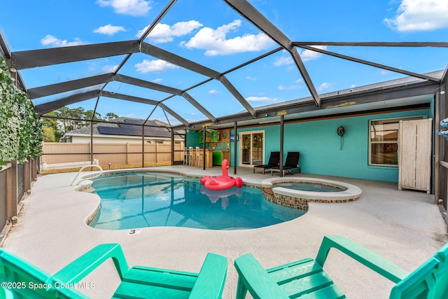 view of pool with a patio area, a fenced backyard, and glass enclosure