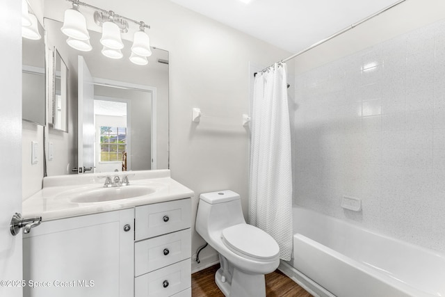 full bath with toilet, wood finished floors, vanity, and shower / bath combination with curtain