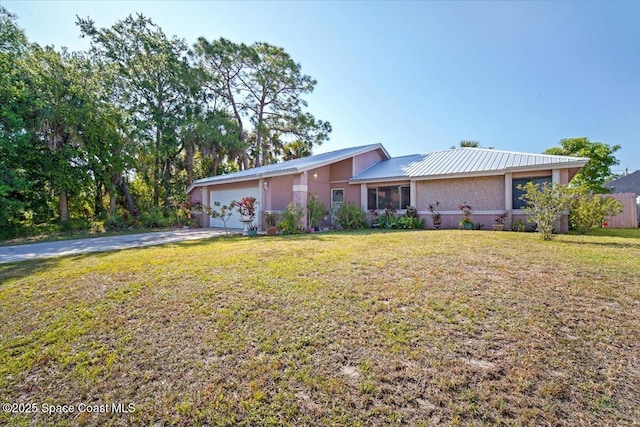 326 Brescia St NE, Palm Bay, FL 32907 - ranch-style home with concrete driveway, an attached garage, and a front yard