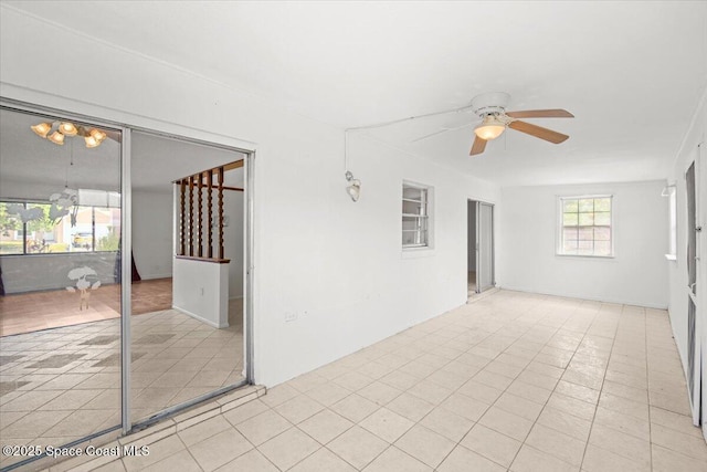 326 Brescia St NE, Palm Bay, FL 32907 - unfurnished room with ceiling fan and light tile patterned floors