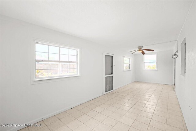 326 Brescia St NE, Palm Bay, FL 32907 - unfurnished room with ceiling fan and baseboards