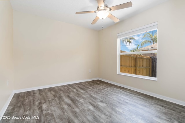 5230 Everett St, Cocoa, FL 32927 - spare room with wood finished floors, baseboards, and ceiling fan