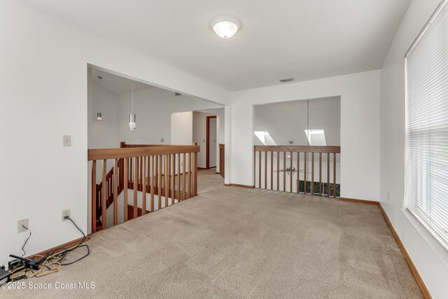 950 Vanessa Ct Unit F, Port Orange, FL 32127 - carpeted empty room with baseboards