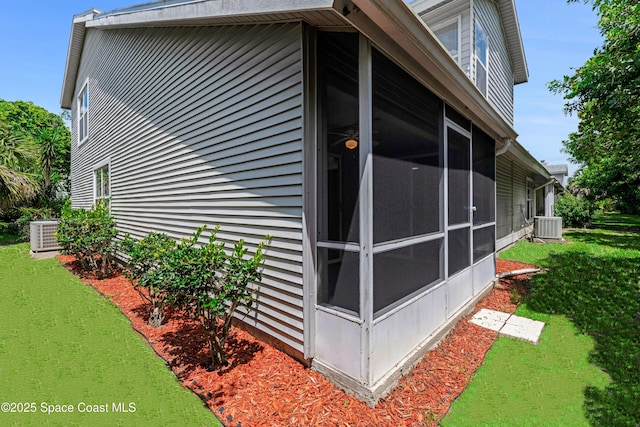 950 Vanessa Ct Unit F, Port Orange, FL 32127 - view of side of home with a sunroom and cooling unit