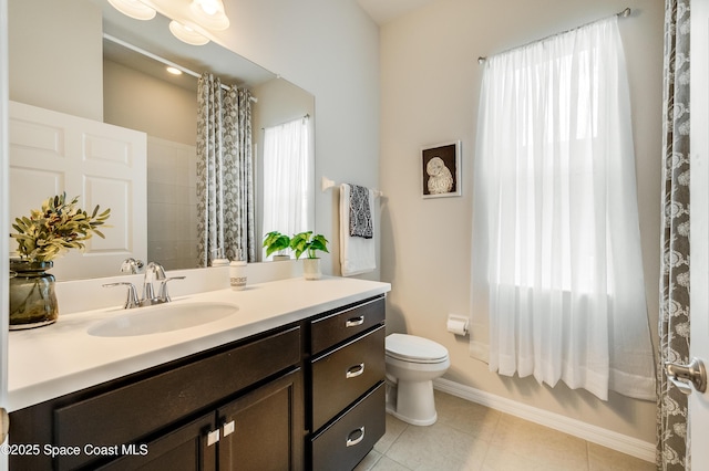 2679 Avalonia Dr, Melbourne, FL 32940 - full bathroom with vanity, tile patterned flooring, and a shower with curtain