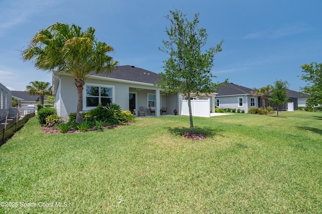 2679 Avalonia Dr, Melbourne, FL 32940 - ranch-style home featuring a garage, stucco siding, and driveway