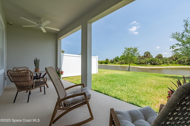 2679 Avalonia Dr, Melbourne, FL 32940 - view of patio featuring a water view and ceiling fan