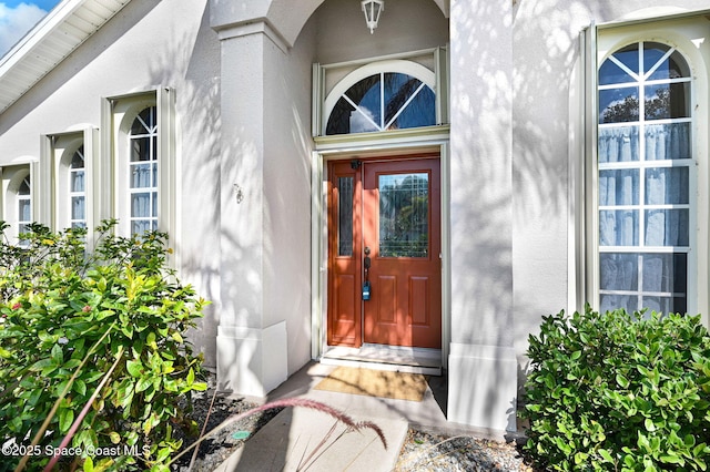 4040 Estancia Way, Melbourne, FL 32934 - entrance to property featuring stucco siding